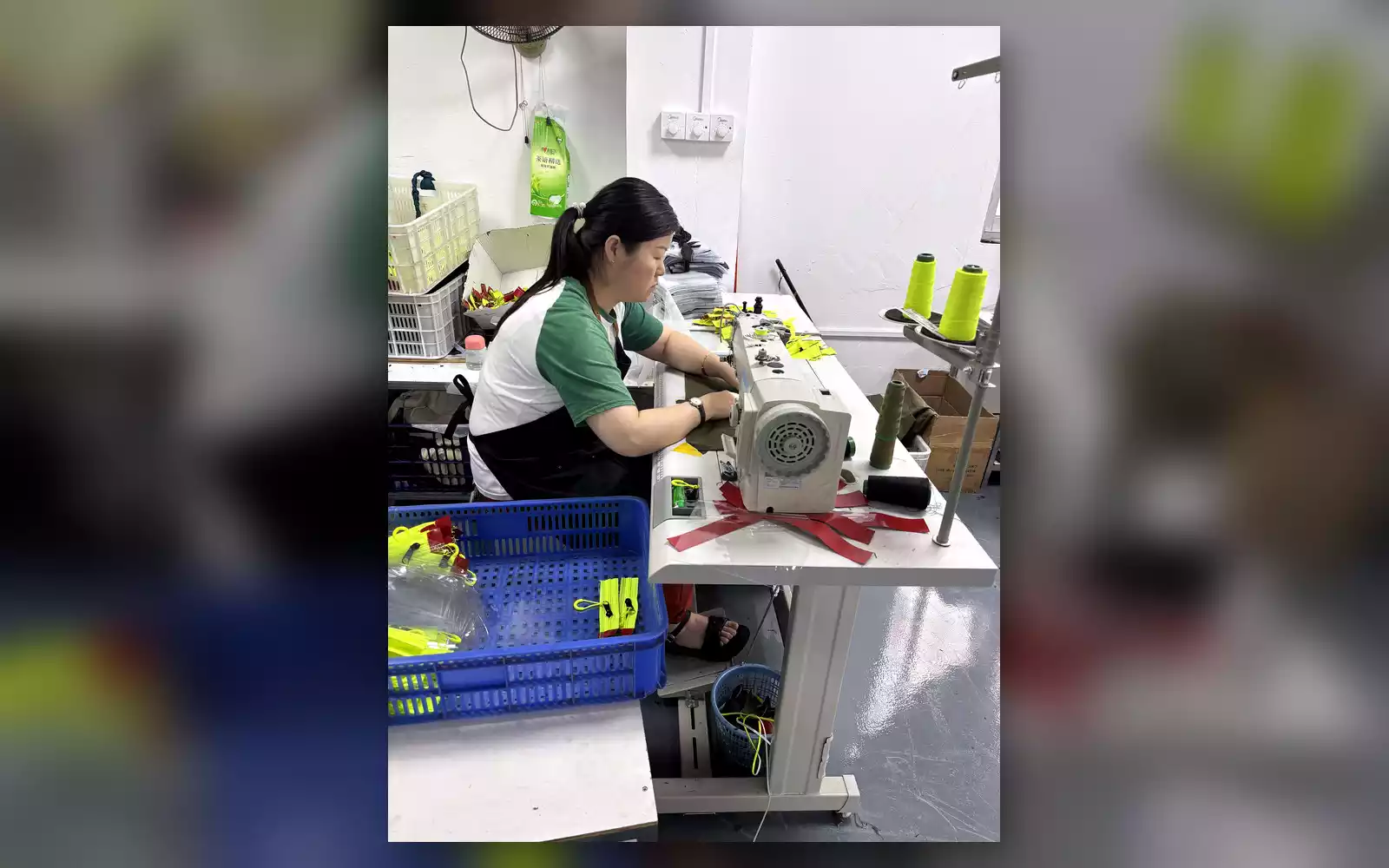 Skilled operator sewing custom bag components